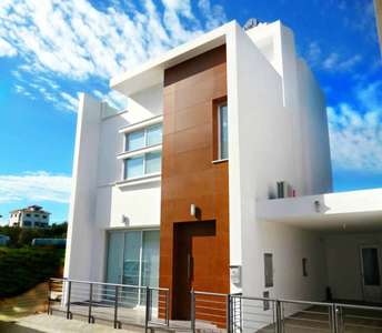 Modern house with a minimalist design, featuring an impressive wood-paneled main entrance, large windows, and covered parking