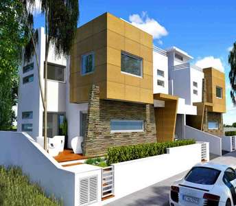 Modern home with a sleek design, featuring a combination of stone and wood accents and a stylish façade