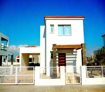 Charming island-style detached home in Larnaca province, featuring stone accents and a perimeter garden