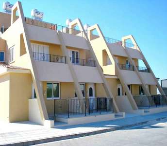 Second-hand townhouse in Famagusta province with distinctive architecture and large balconies