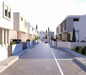 Row of detached houses with private driveways in Livadia, featuring sleek architectural design and clean lines