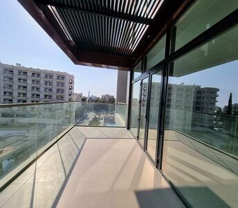 Second veranda of the apartment with a stylish canopy, and stunning urban views