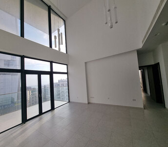 Minimalist design living room with plasterboard ceiling decoration, VRV air conditioners, and large floor-to-ceiling windows