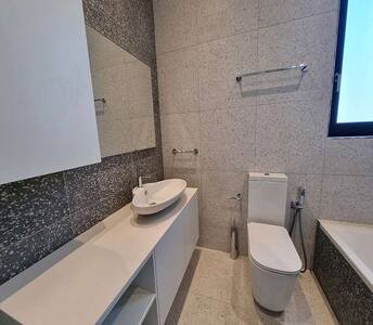 The main bathroom with stylish sanitary ware and modern design elements