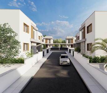 View of private residential street in Souni, Limassol, with modern 3-bedroom homes, landscaped walkways, and gated community design.
