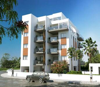 Residential corner building in Agios Athanasios featuring geometric architecture and glass railing balconies
