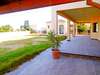 Backyard of the house in Larnaca district, featuring a large veranda, spacious outdoor area, and a maid’s room